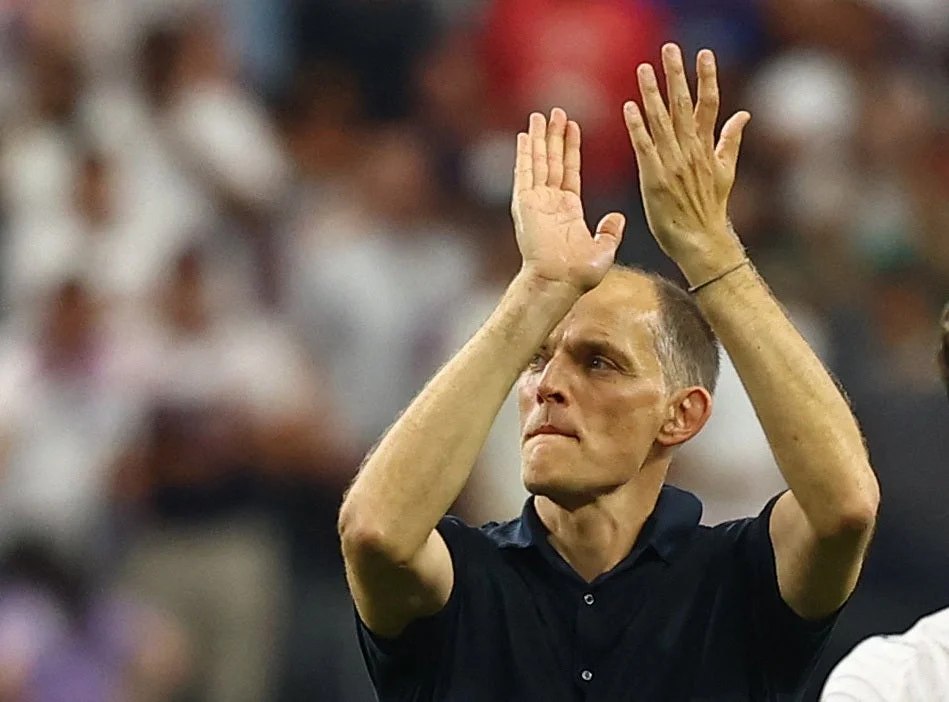 England manager Thomas Tuchel applauds their fans after the match